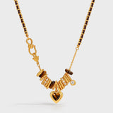 Nocturne Heart Charm Necklace